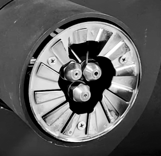 Quemador de combustible líquido tipo eyector con boquillas y remolinos